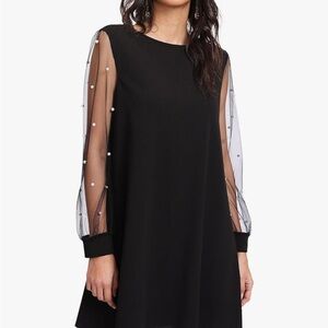 Chic Black Dress with Sheer Embellished Sleeves